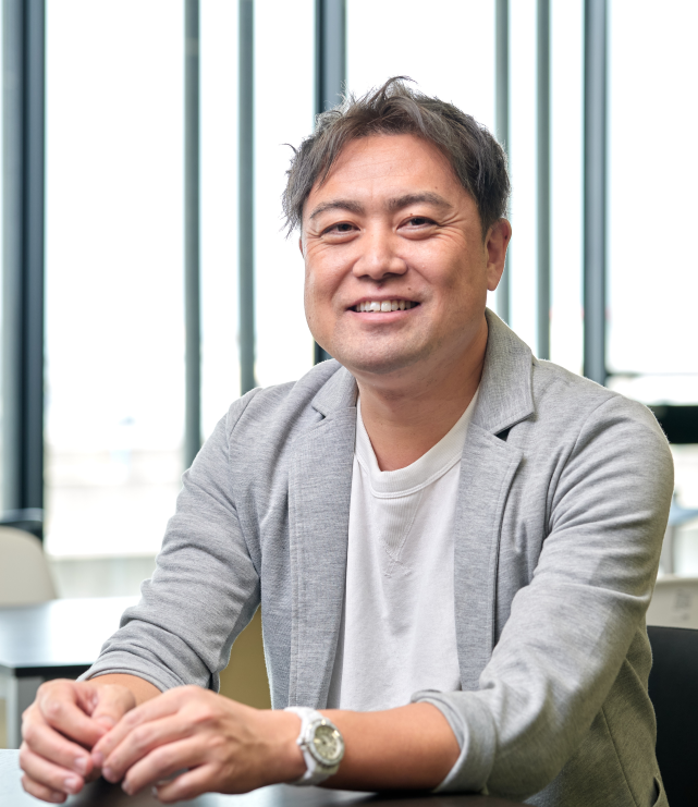 巻田 友和氏